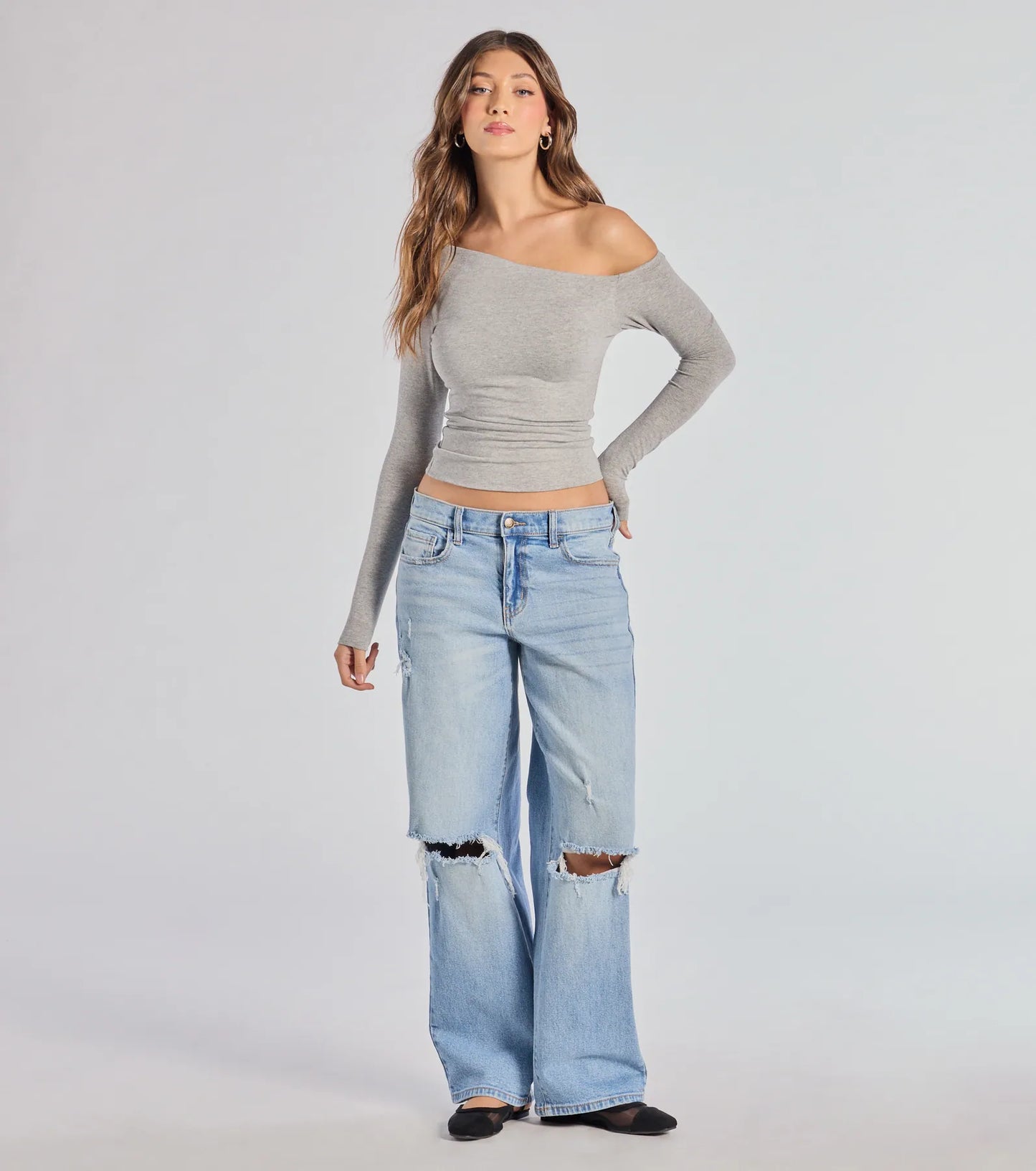 From bold to effortless, the Chic Factor Asymmetrical Long Sleeve Crop Top lets you define your vibe with heather gray tops that speak your style.