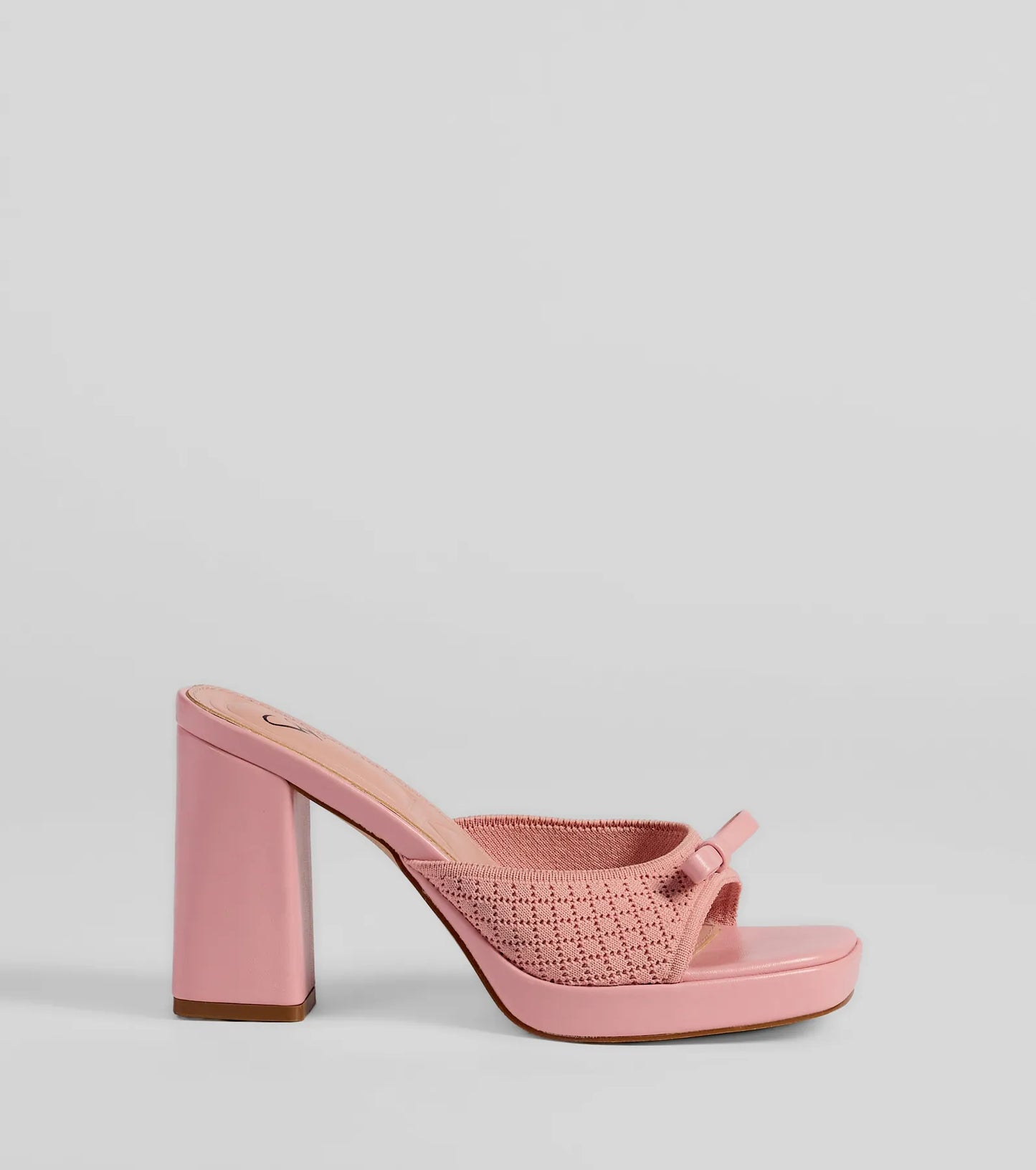 Stay on-trend this season with the Cute Vibes Bow Platform Knit Mules in pink, a must-have for creating stylish and effortless spring outfits for women.