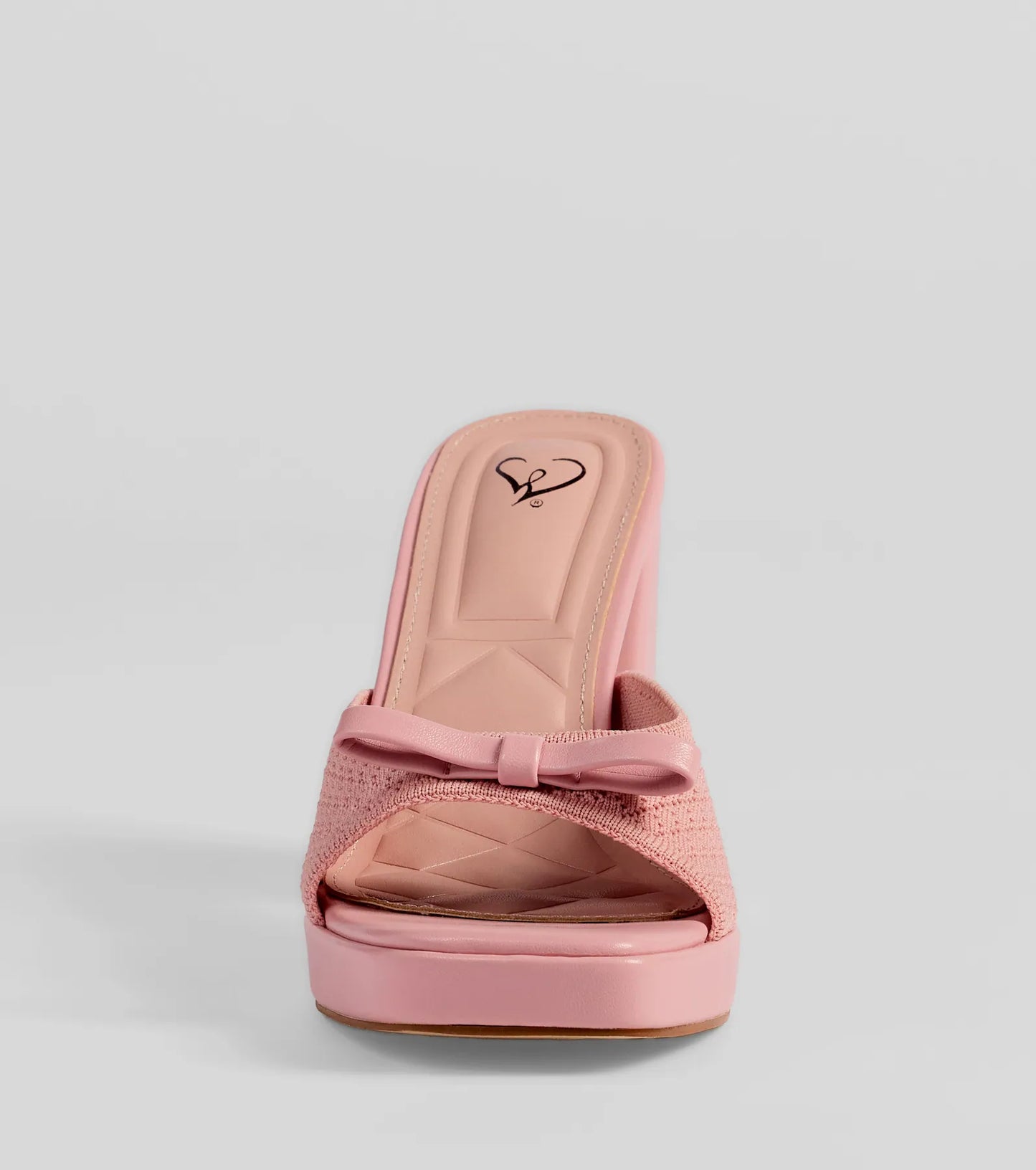 Stay on-trend this season with the Cute Vibes Bow Platform Knit Mules in pink, a must-have for creating stylish and effortless spring outfits for women.