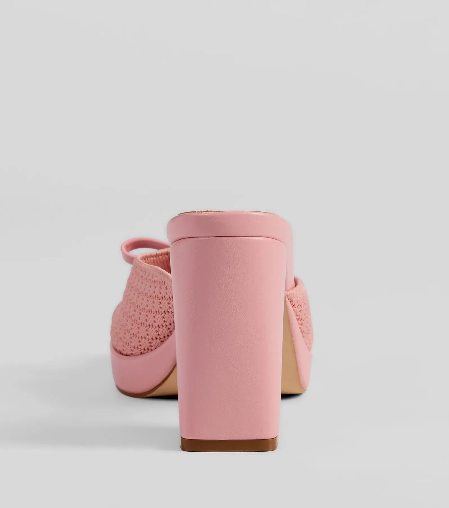 Stay on-trend this season with the Cute Vibes Bow Platform Knit Mules in pink, a must-have for creating stylish and effortless spring outfits for women.